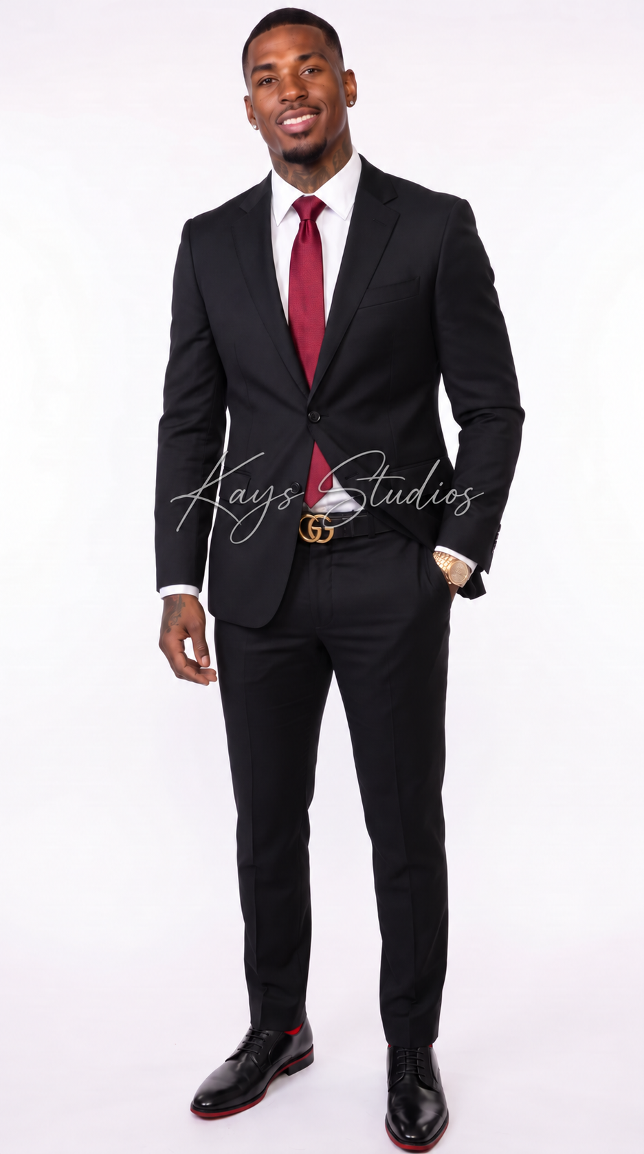 Outfit 4: Max in black suit & red tie